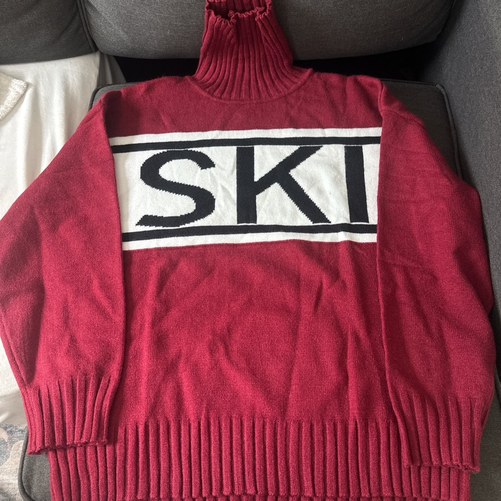 Bold Red Turtleneck Sweater with SKI Graphic